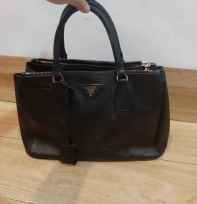 Prada zipper lempo